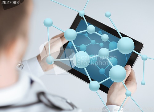 Image of close up of doctor with stethoscope and tablet pc