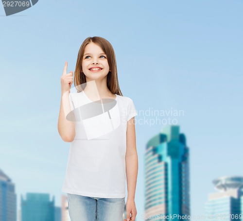 Image of smiling little girl in white blank t-shirt