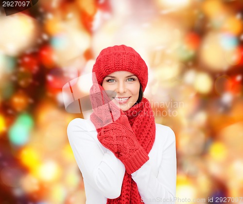 Image of smiling young woman in winter clothes