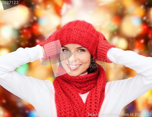 Image of smiling young woman in winter clothes