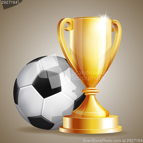 Image of Gold cup with a football ball