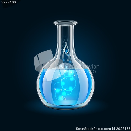 Image of Transparent flask with magic blue liquid on black background.