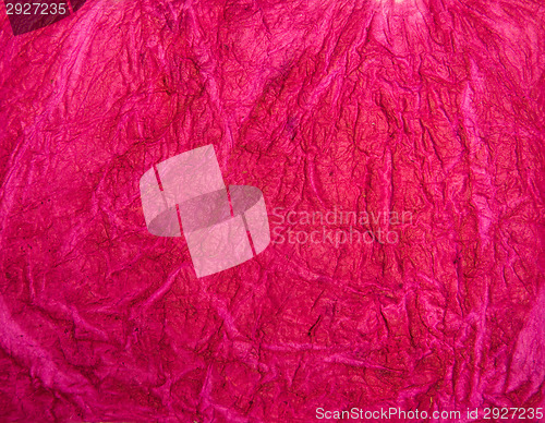 Image of Magenta crumpled handmade paper texture