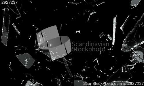 Image of Shattered and splitted glass Pieces over black