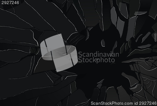 Image of Many large pieces of shattered glass isolated on black