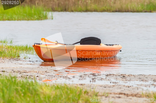 Image of orange kayak on pamlino sound beach 