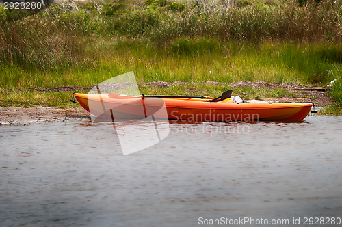 Image of orange kayak on pamlino sound beach 