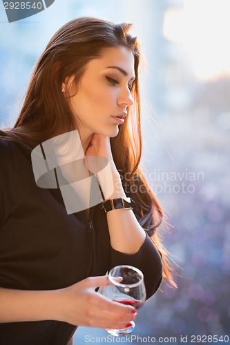 Image of Portrait of thoughtful young woman