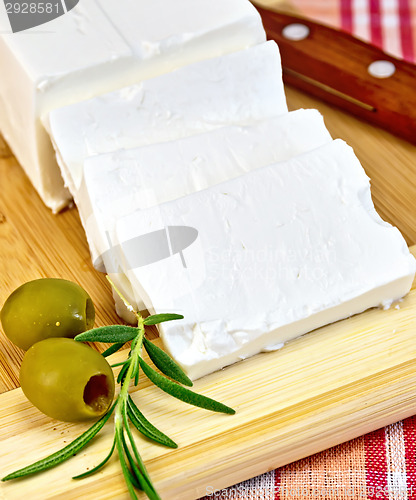 Image of Feta with olives on a red fabric