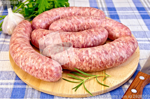 Image of Sausages pork on blue cloth