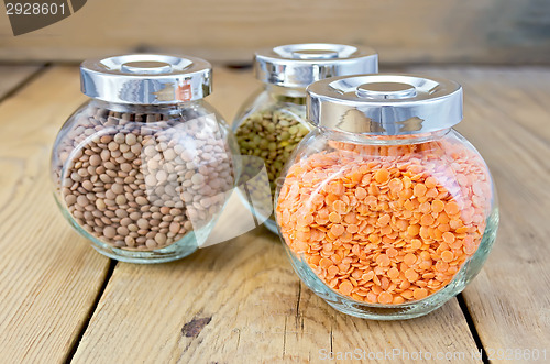 Image of Lentils different in jars on the board