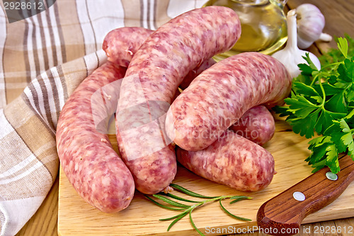 Image of Sausages pork on board