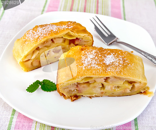 Image of Strudel with pears on tablecloth