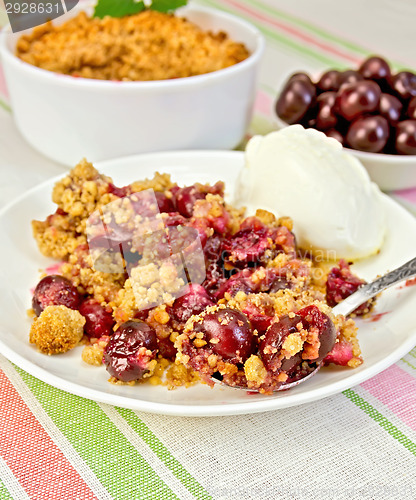 Image of Crumble cherry with berries on plate