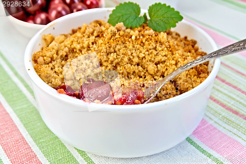 Image of Crumble cherry with berries on napkin