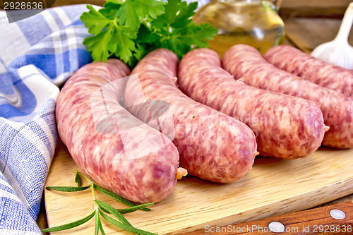 Image of Sausages pork with rosemary on board