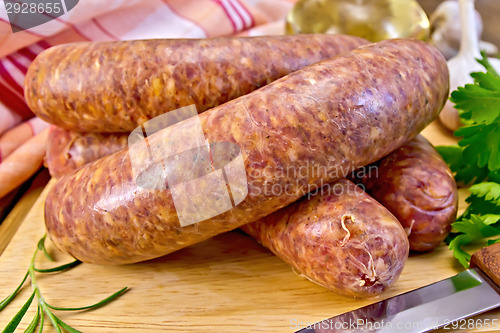Image of Sausages beef on a board