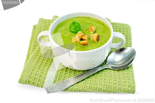 Image of Soup puree with spinach and napkin