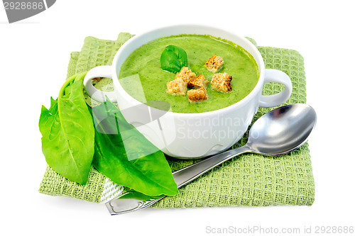 Image of Soup puree with spinach and spoon
