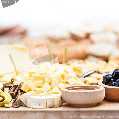 Image of Cheese Plate with Dried Fruit and Honey 