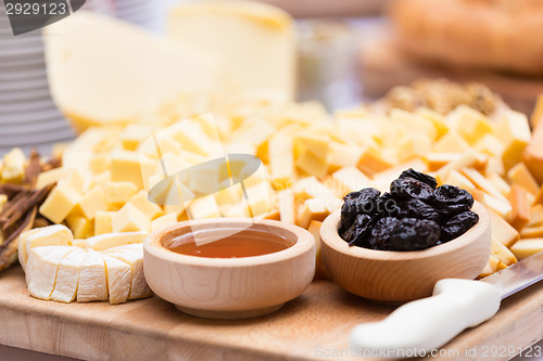 Image of Cheese Plate with Dried Fruit and Honey 