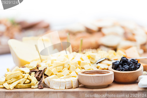 Image of Cheese Plate with Dried Fruit and Honey 