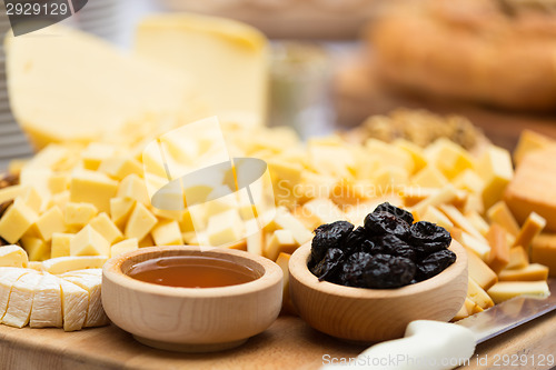 Image of Cheese Plate with Dried Fruit and Honey 