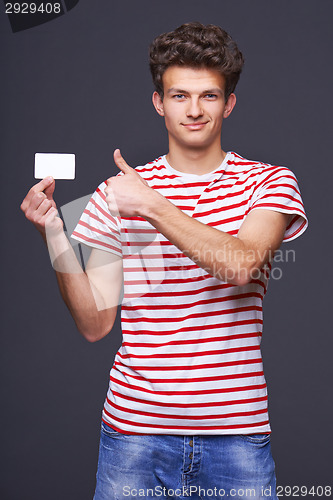 Image of Man showing empty blank paper card sign