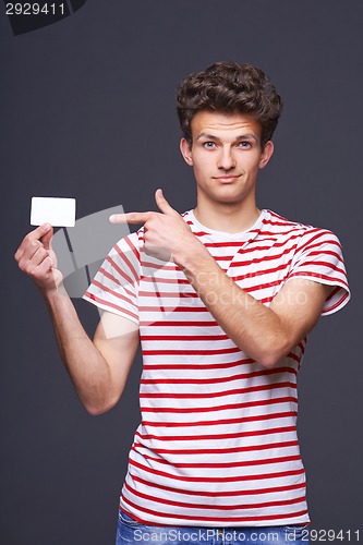 Image of Man showing empty blank paper card sign