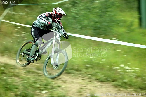 Image of down hill mountain bike racer