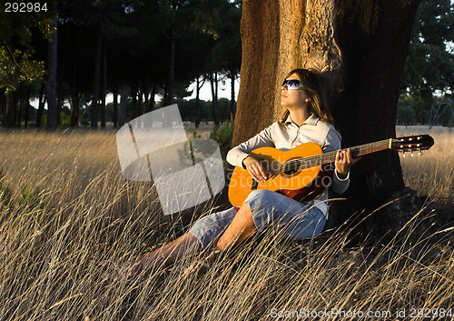Image of Playing guitar