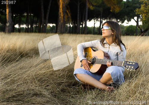 Image of Playing guitar