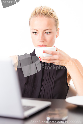 Image of Business woman with cup of coffee.