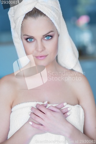 Image of Young Woman Wearing White Bath Towel