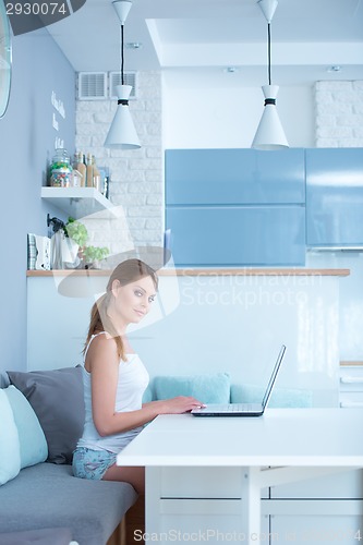 Image of Woman Using Laptop