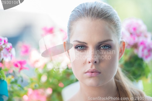 Image of Beautiful blond woman with a dreamy expression