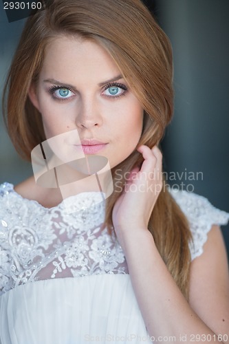 Image of Close Up of Woman Wearing White Lacy Top