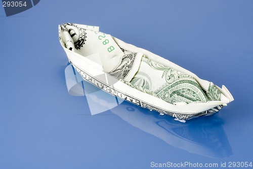 Image of Dollar note paper boat

