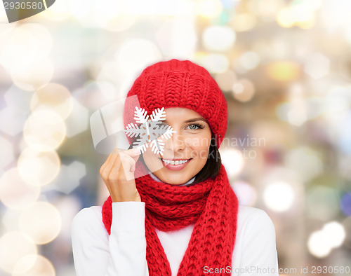 Image of smiling young woman in winter clothes