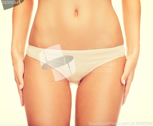 Image of woman in cotton underwear showing slimming concept