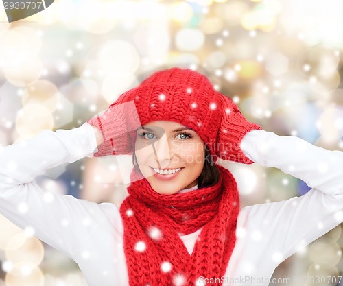 Image of smiling young woman in winter clothes