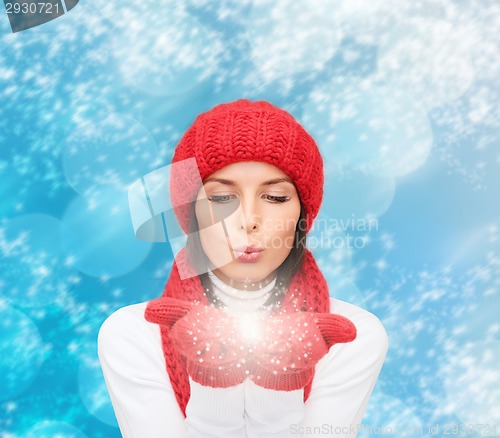 Image of smiling young woman in winter clothes