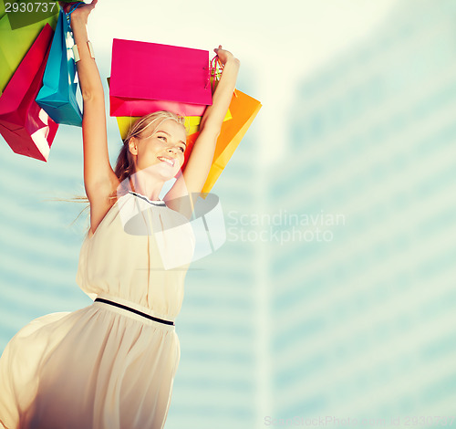 Image of woman with shopping bags
