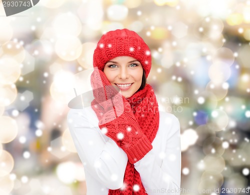 Image of smiling young woman in winter clothes