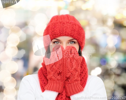 Image of smiling young woman in winter clothes