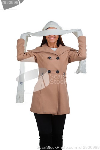 Image of Woman in outrwear, white scarf and hat