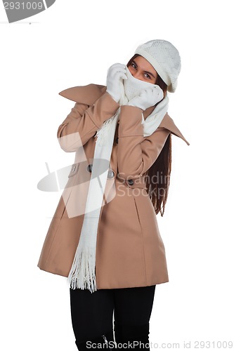 Image of Woman in outrwear, white scarf and hat