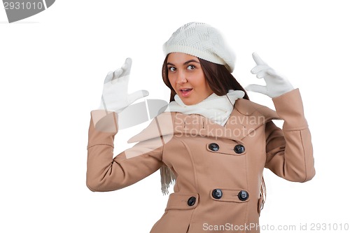 Image of Woman in outrwear, white scarf and hat