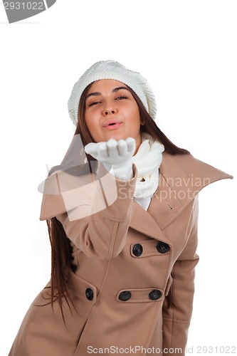 Image of Woman in outrwear, white scarf and hat