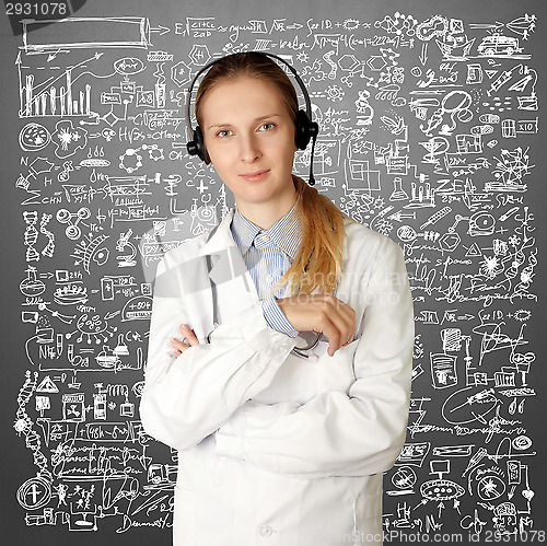 Image of doctor woman with headphones smile at camera